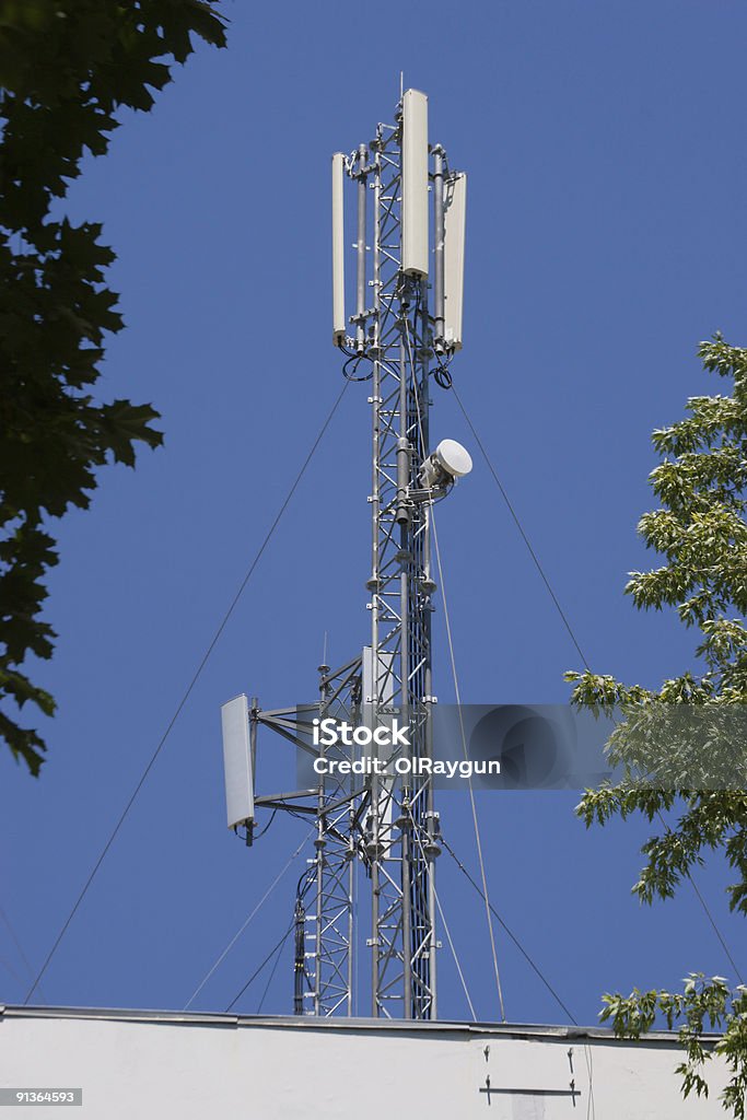 Radio masts on rooftop  Mobile Phone Base Station Stock Photo