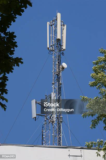 Radio Masts On Rooftop Stock Photo - Download Image Now - Mobile Phone Base Station, Rooftop, Antenna - Aerial