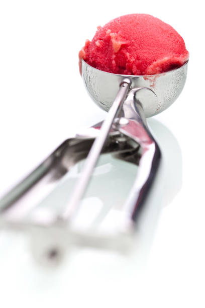istock scoop of fruit ice cream isolated on white background 913646242