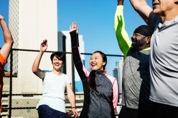 Photo of People exercising at fitness gym