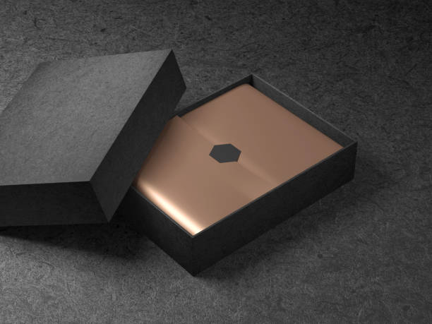 istock Black opened Box with golden wrapping paper and label 913648470