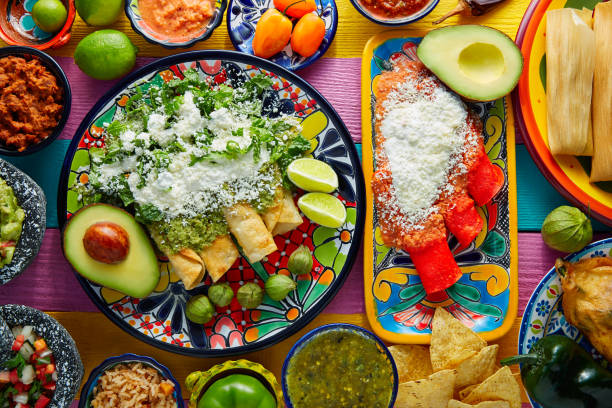 istock Green and red enchiladas with mexican sauces 913649882