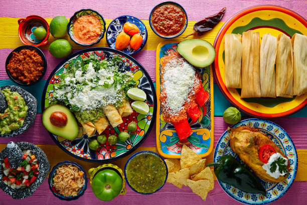 istock Green and red enchiladas with mexican sauces 913649982