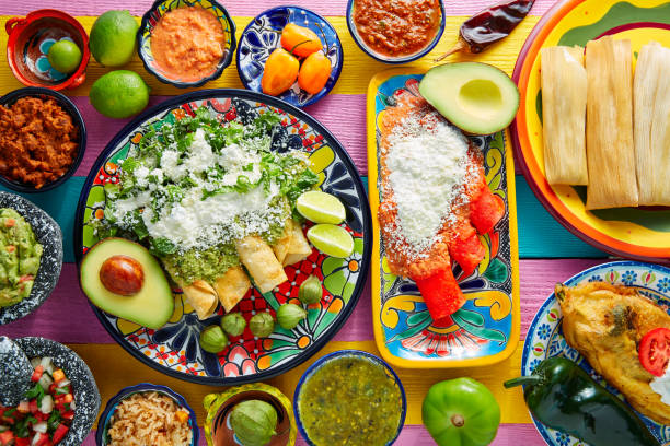istock Green and red enchiladas with mexican sauces 913650042