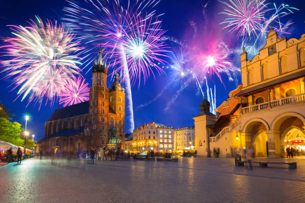 new years firework display in krakow - cloth hall imagens e fotografias de stock