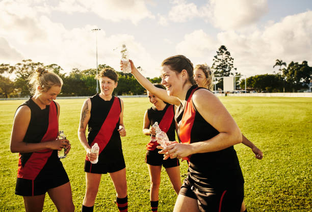 drinking to a good game - australian rugby championship imagens e fotografias de stock