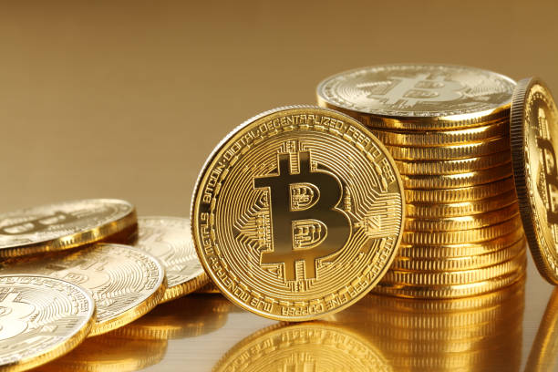 Golden Bitcoins. New virtual money stock photo