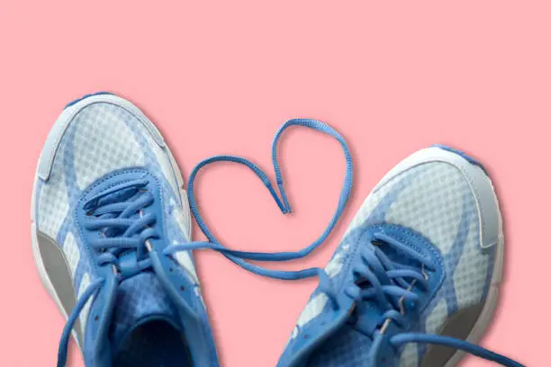 Shoelaces with heart sign, love sport concept.