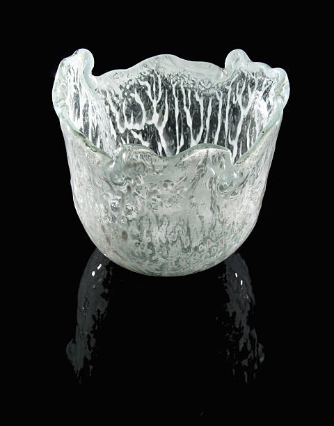 istock White striped glass bowl on a transparent surface 91365479