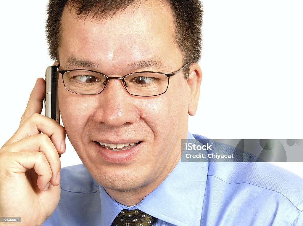 Cross Eyed Mann mit einem Mobiltelefon - Lizenzfrei Blau Stock-Foto