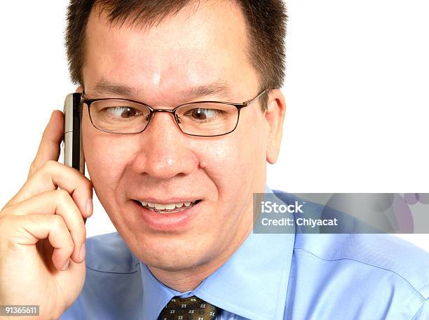 Cross Eyed Mann Mit Einem Mobiltelefon Stockfoto und mehr Bilder von Blau - Blau, Brille, Drahtlose Technologie