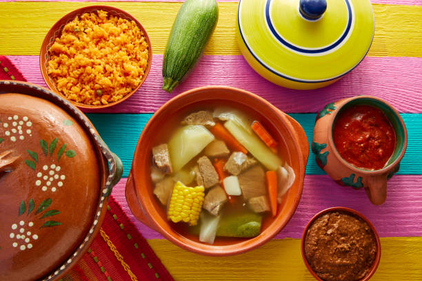 istock Caldo de res Mexican beef broth in table 913657790