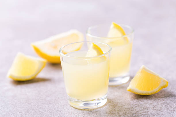 istock Italian lemon lime liqueur limoncello with ice and mint 913657826