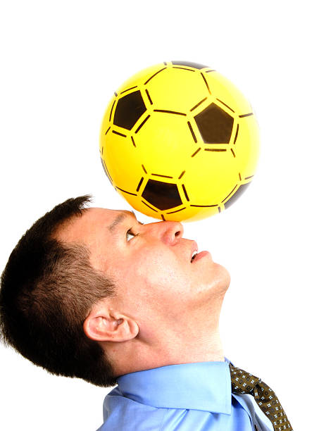 istock Man With A Yellow Ball on His Nose 91365829