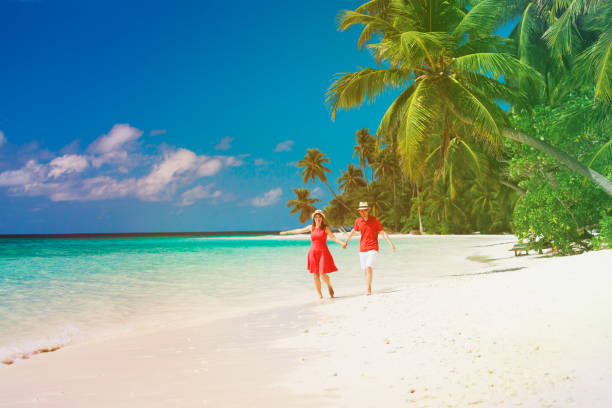 istock happy loving couple enjoy tropical beach 913664800
