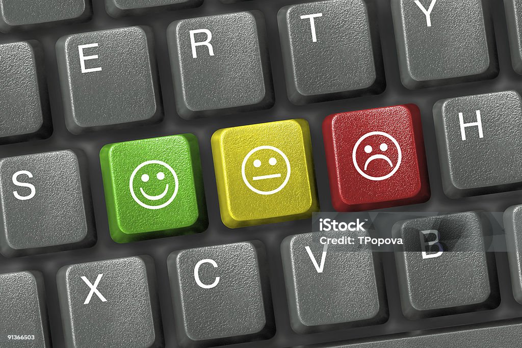 Primer plano de teclado con teclas de tres smiley - Foto de stock de Cara sonriente antropomórfica libre de derechos