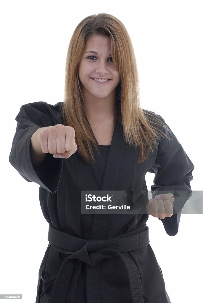 Punching exercise Martial artist punching. Adult Stock Photo