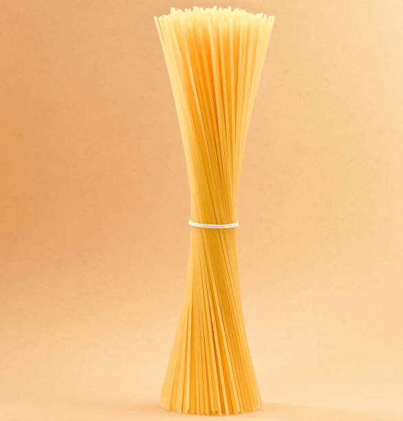 istock Pasta tied up by a rope 913669928