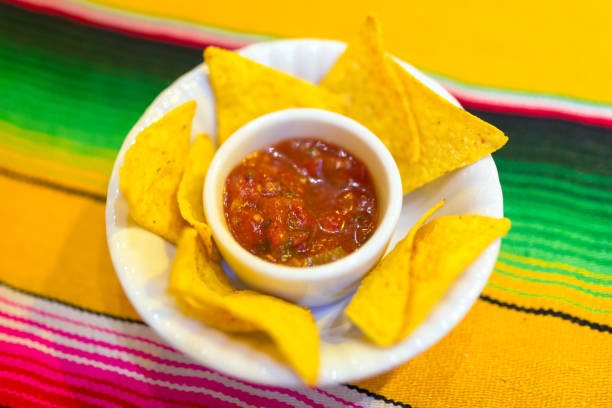istock Nachos with mexican salsa sauce 913676724