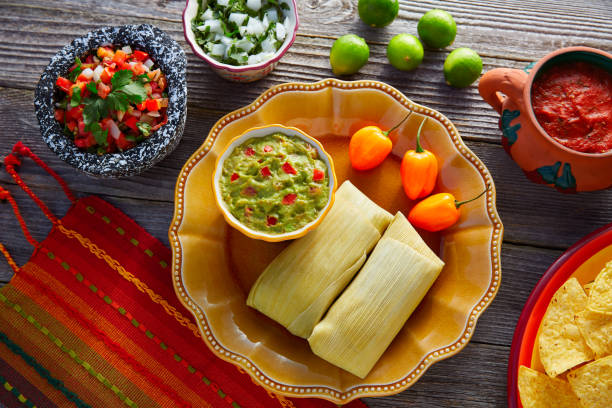 istock Mexican Tamale tamales of corn leaves 913677620