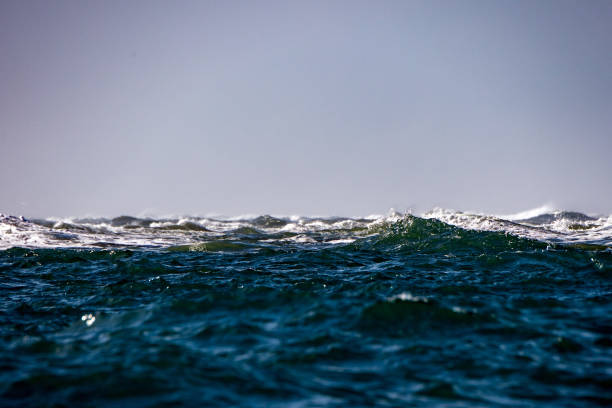 istock sea ocean big waves detail sun glitter 913678904