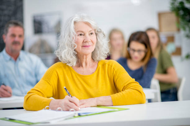 istock Senior Woman At University 913682942