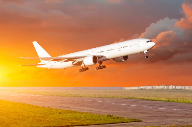 istock Big passenger airplane take off at sunset clouds on a runway. 913685734