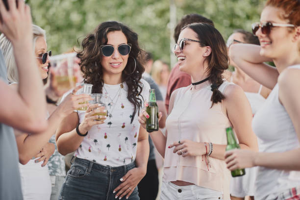 istock Big crowd of people having a party 913688962