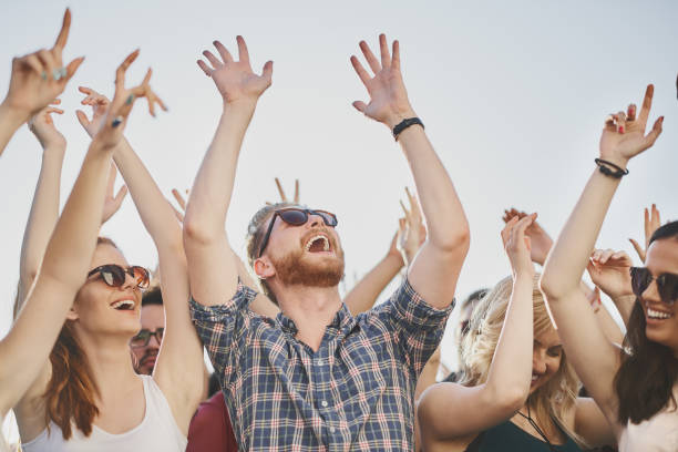 istock Big crowd of people having a party 913689306