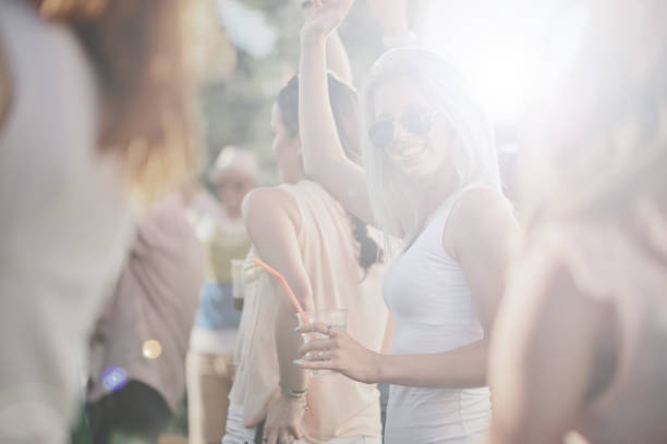 istock Big crowd of people having a party 913689460