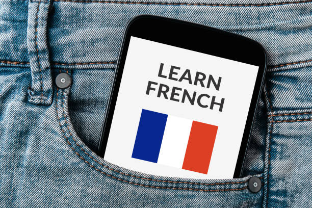 istock Learn French concept on smartphone screen in jeans pocket 913690488