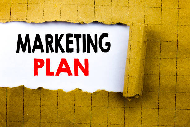 istock Word, writing Marketing Plan. Business concept for Planning Successful Strategy written on white paper on the yellow folded paper. 913690962