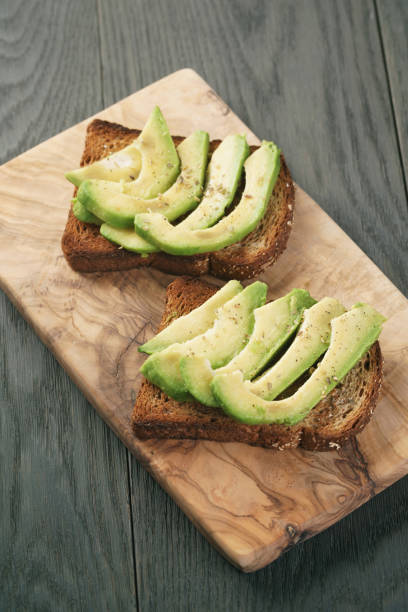 istock open sandwiches with avocado and spices 913694230