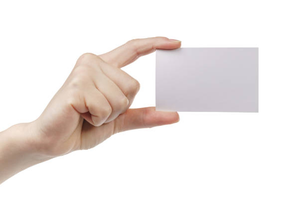 istock young woman hand showing empty paper card to camera 913697540