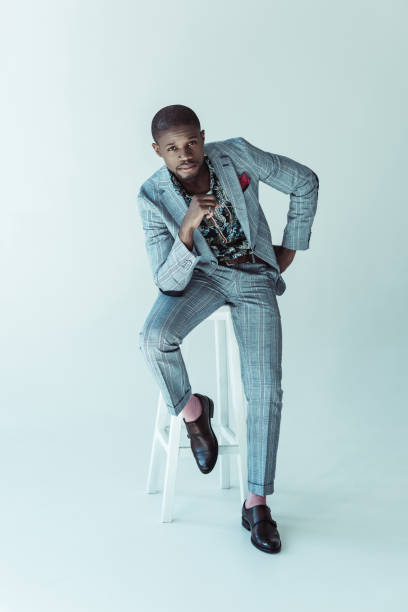 Stylish african american man on bar stool