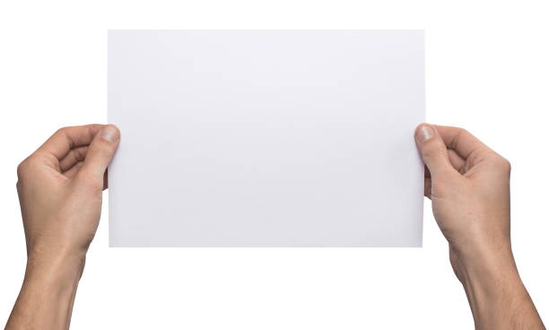 istock Mockup A4 letter horizontally empty blank white holds the man in his hand. Isolated on a white background 913702182