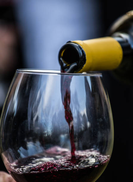 istock Wine bottle and crystal glass 913705328