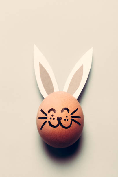 istock Bunny egg with long ears and whiskers. 913708444