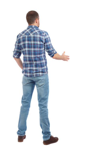 Back side view of man  in shirt handshake. Back side view of man  in shirt handshake.  Rear view people collection.  backside view of person.  Isolated over white background. A man in a blue shirt stretches out his hand for a friendly greetings estrechar las manos stock pictures, royalty-free photos & images