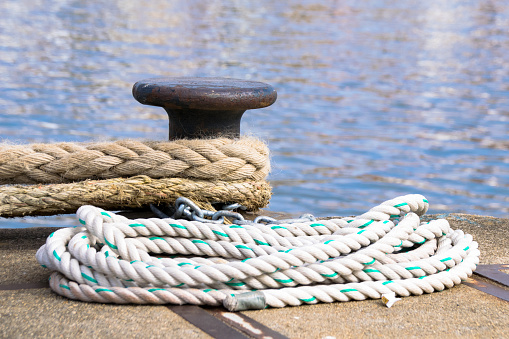 Sail, closeup and a boat on the water for travel, luxury cruise or adventure during summer. Sailing, ship and a yacht on the ocean for a holiday, vacation or to explore nature at sea