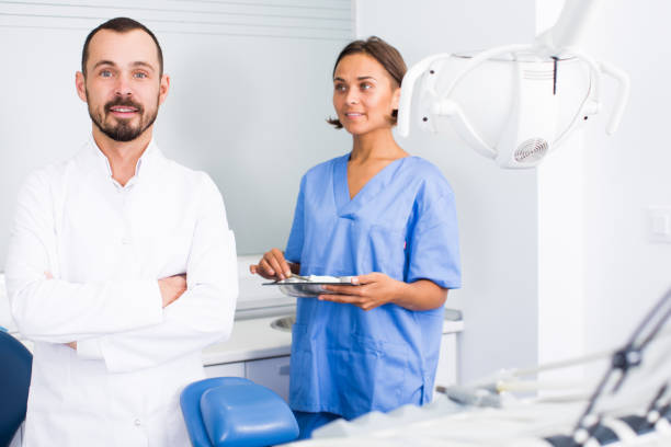 istock Assistant and doctor are meeting next client 913709526