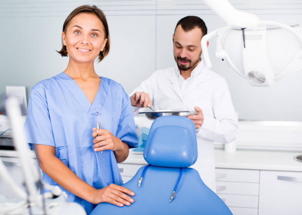 istock Portrait of dentist and assistant 913709528