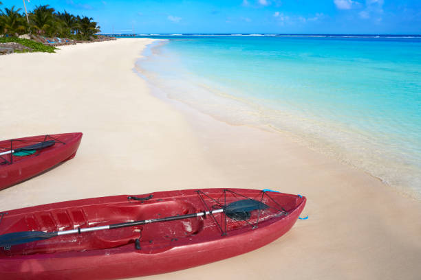 Aerial view of man kayaking.by polluted beach, Phu Quoc