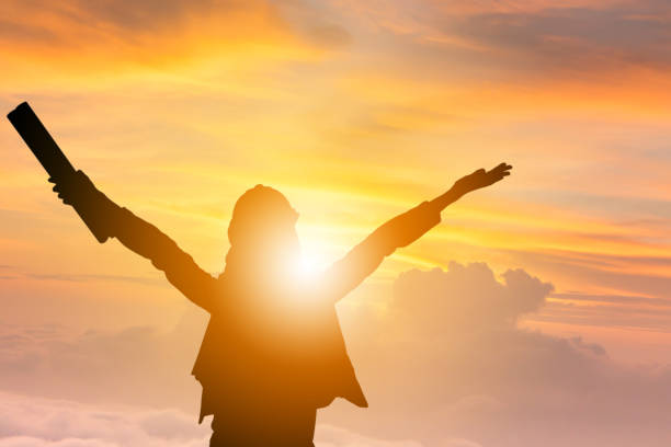 istock Silhouette of Business engineer wonan with clipping path celebration success happiness on evening sky sunset sackground, Active and enjoy life concept 913709536