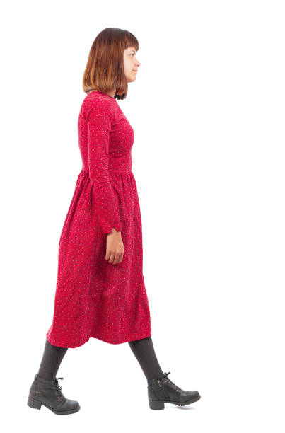 istock back view of walking  woman. 913709716