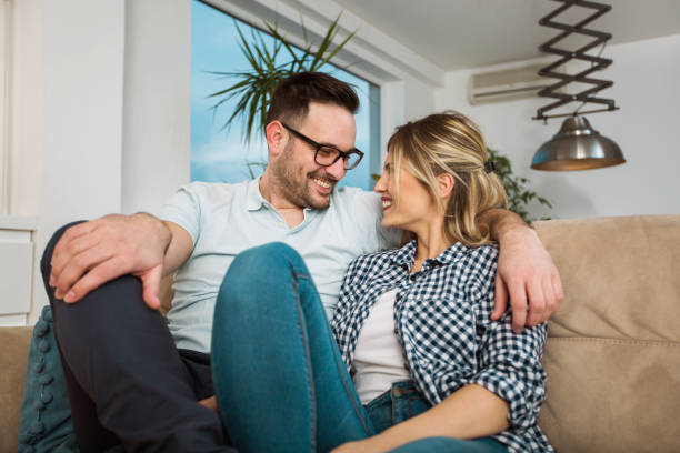 istock Happy young couple at home 913710552