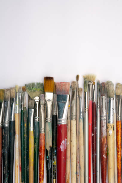 istock Much used artists paint brushes 913714120