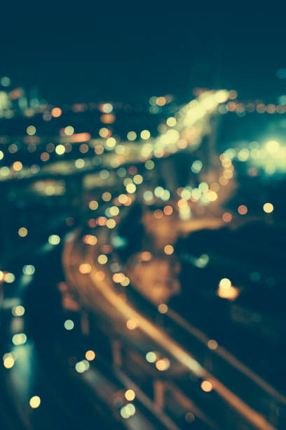 istock Defocused Urban Scene at Night 913714248