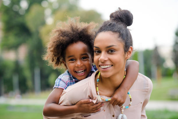 istock Mother and daughter at the park. 913714496