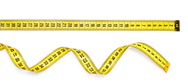 istock Yellow measuring tape isolated on white background 913716968